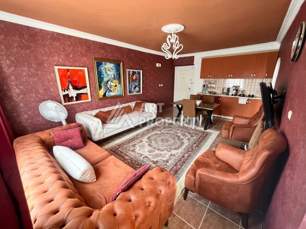 Квартира 1+1 в Махмутларе в районе вторничного рынка, 55 м² - Ракурс 0