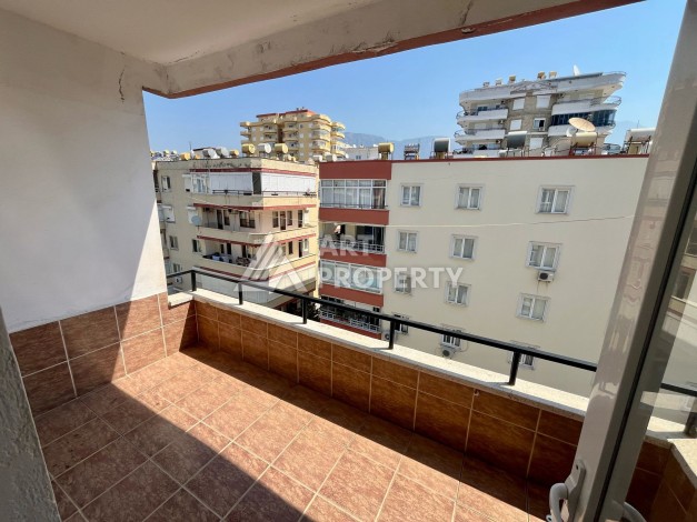 Квартира 1+1 в Махмутларе в районе вторничного рынка, 55 м² - Ракурс 2