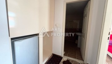 Квартира 1+1 в Махмутларе в районе вторничного рынка, 55 м² - Ракурс 4