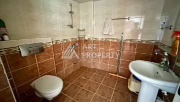 Квартира 1+1 в Махмутларе в районе вторничного рынка, 55 м² - Ракурс 6