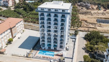 Меблированная квартира 1+1 в Махмутларе, 50 м² - Ракурс 1