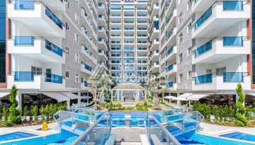 Квартира 1+1 в элитном ЖК, 68 м². Махмутлар, Алания - Ракурс 1