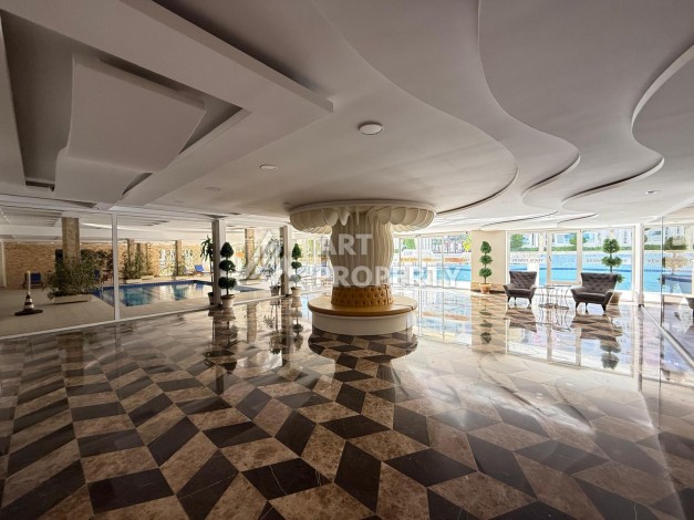Большая квартира 1+1 в Махмутларе, 65м². Горящая цена - Ракурс 32