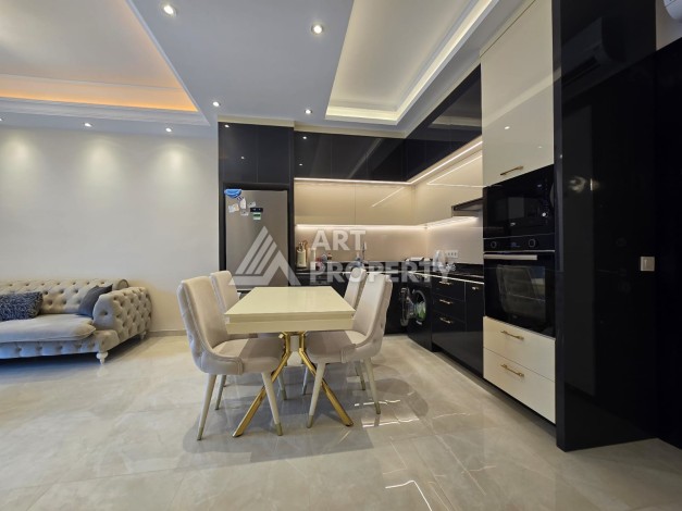 Большая квартира 1+1 в элитном ЖК, 65 м². Махмутлар, Алания - Ракурс 5