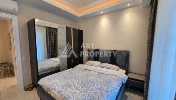 Большая квартира 1+1 в элитном ЖК, 65 м². Махмутлар, Алания - Ракурс 11