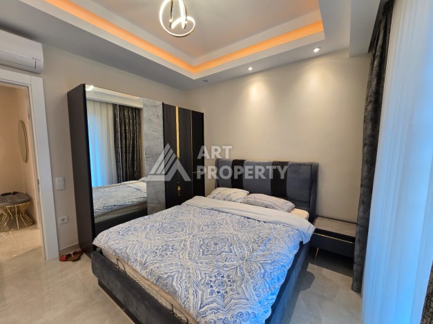 Большая квартира 1+1 в элитном ЖК, 65 м². Махмутлар, Алания - Ракурс 10