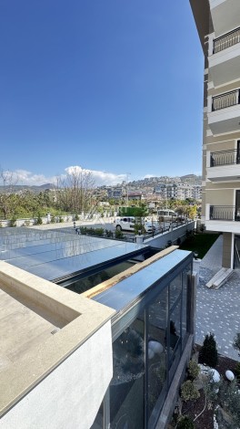 Квартира 1+1 - 58 м²  в ЖК премиум класса. Каргыджак, Алания - Ракурс 37