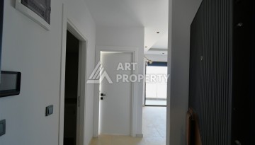 Квартира 1+1 в центре Махмутлара, 60 м². Вид на море - Ракурс 2