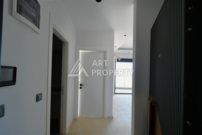Квартира 1+1 в центре Махмутлара, 60 м². Вид на море - Ракурс 1