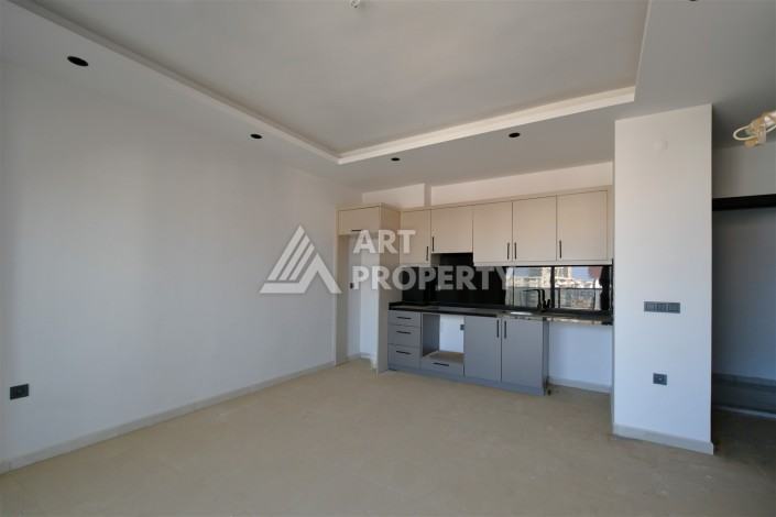 Квартира 1+1 в центре Махмутлара, 60 м². Вид на море - Ракурс 5
