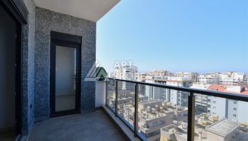 Квартира 1+1 в центре Махмутлара, 60 м². Вид на море - Ракурс 9