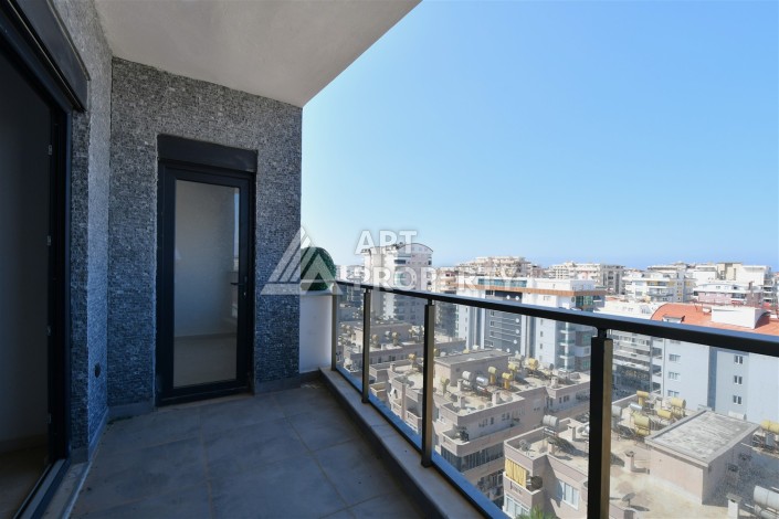 Квартира 1+1 в центре Махмутлара, 60 м². Вид на море - Ракурс 8