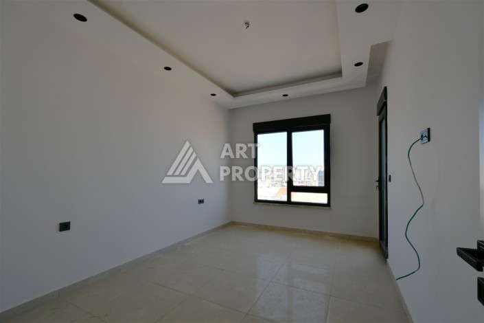 Квартира 1+1 в центре Махмутлара, 60 м². Вид на море - Ракурс 9