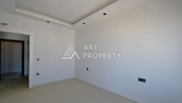 Квартира 1+1 в центре Махмутлара, 60 м². Вид на море - Ракурс 11