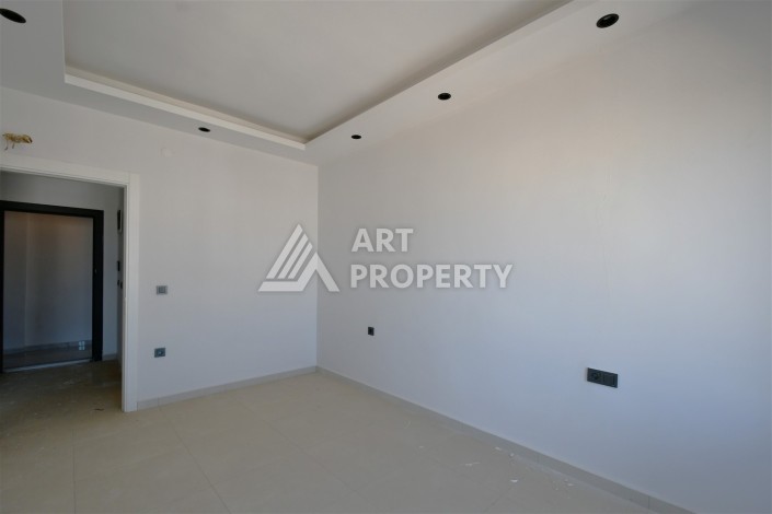 Квартира 1+1 в центре Махмутлара, 60 м². Вид на море - Ракурс 10
