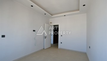Квартира 1+1 в центре Махмутлара, 60 м². Вид на море - Ракурс 12