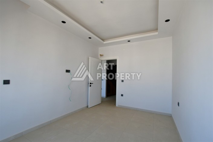 Квартира 1+1 в центре Махмутлара, 60 м². Вид на море - Ракурс 11