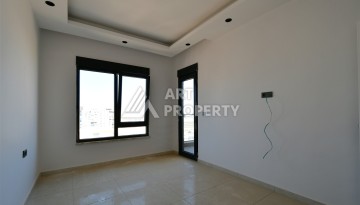 Квартира 1+1 в центре Махмутлара, 60 м². Вид на море - Ракурс 13