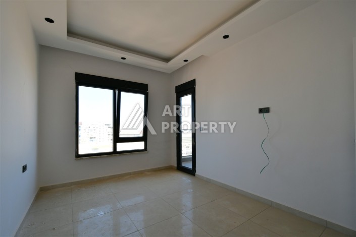 Квартира 1+1 в центре Махмутлара, 60 м². Вид на море - Ракурс 12