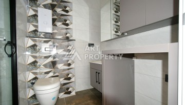 Квартира 1+1 в центре Махмутлара, 60 м². Вид на море - Ракурс 14