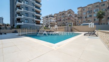 Квартира 1+1 в центре Махмутлара, 60 м². Вид на море - Ракурс 15