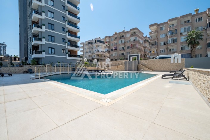 Квартира 1+1 в центре Махмутлара, 60 м². Вид на море - Ракурс 14