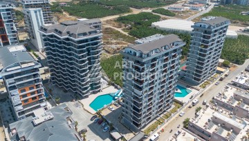 Квартира 1+1 в центре Махмутлара, 60 м². Вид на море - Ракурс 20