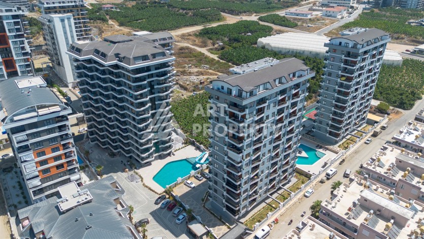 Квартира 1+1 в центре Махмутлара, 60 м². Вид на море - Ракурс 19