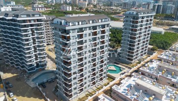 Квартира 1+1 в центре Махмутлара, 60 м². Вид на море - Ракурс 21
