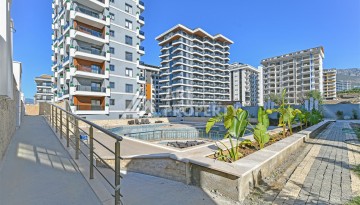 Квартира 1+1 в центре Махмутлара, 60 м². Вид на море - Ракурс 22