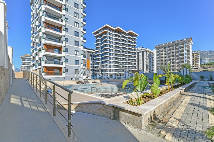 Квартира 1+1 в центре Махмутлара, 60 м². Вид на море - Ракурс 21