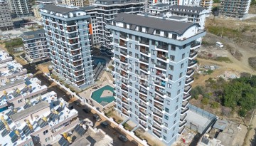 Квартира 1+1 в центре Махмутлара, 60 м². Вид на море - Ракурс 23