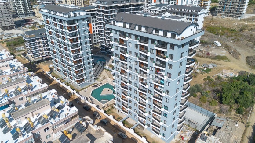 Квартира 1+1 в центре Махмутлара, 60 м². Вид на море - Ракурс 22