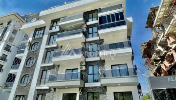 Квартира 1+1 в Махмутларе в новой резиденции, 50 м² - Ракурс 1