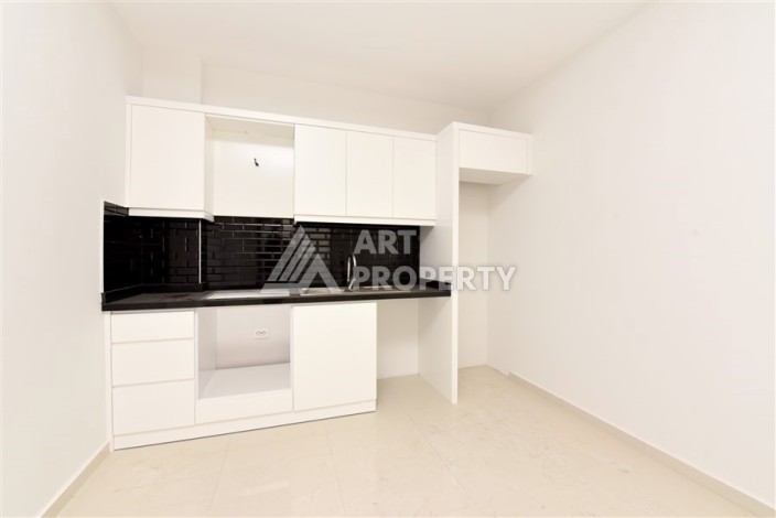 Квартира 1+1 в Махмутларе в новой резиденции, 50 м² - Ракурс 2