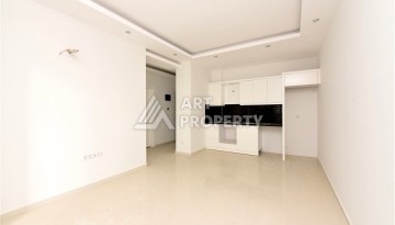 Квартира 1+1 в Махмутларе в новой резиденции, 50 м² - Ракурс 6