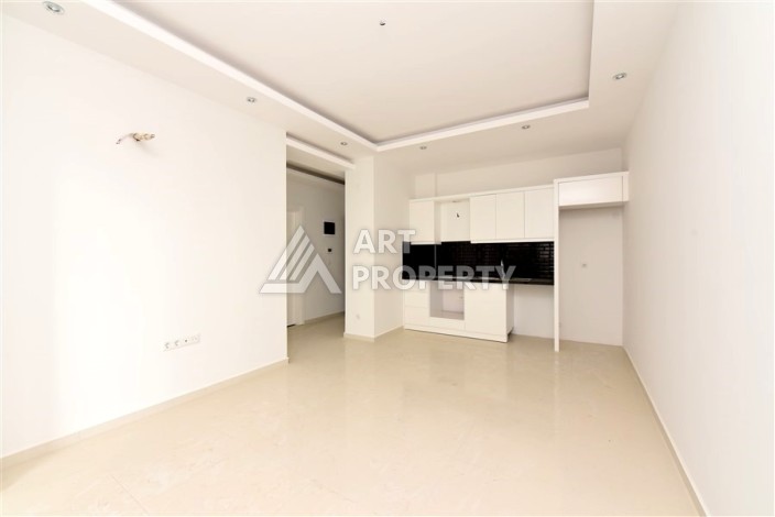 Квартира 1+1 в Махмутларе в новой резиденции, 50 м² - Ракурс 5