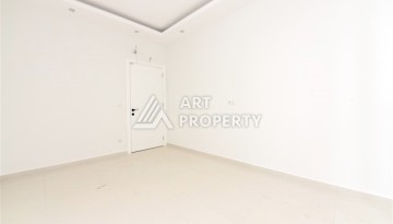 Квартира 1+1 в Махмутларе в новой резиденции, 50 м² - Ракурс 7