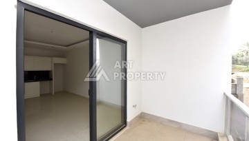 Квартира 1+1 в Махмутларе в новой резиденции, 50 м² - Ракурс 8