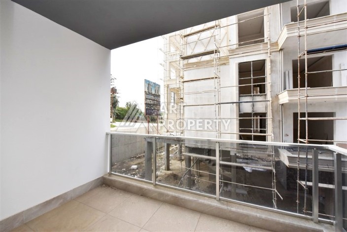 Квартира 1+1 в Махмутларе в новой резиденции, 50 м² - Ракурс 8