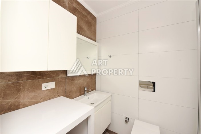 Квартира 1+1 в Махмутларе в новой резиденции, 50 м² - Ракурс 9