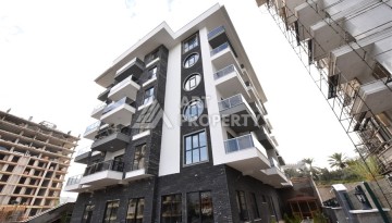 Квартира 1+1 в Махмутларе в новой резиденции, 50 м² - Ракурс 12