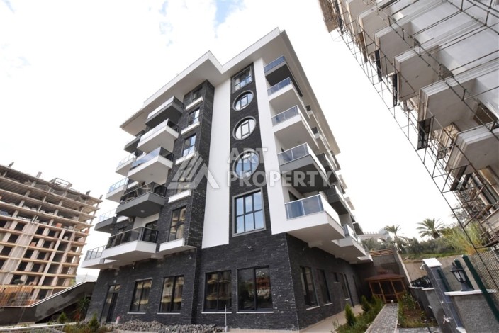 Квартира 1+1 в Махмутларе в новой резиденции, 50 м² - Ракурс 11