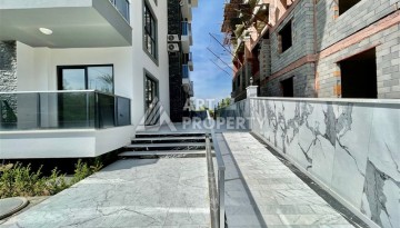Квартира 1+1 в Махмутларе в новой резиденции, 50 м² - Ракурс 14