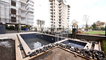 Квартира 1+1 в Махмутларе в новой резиденции, 50 м² - Ракурс 16