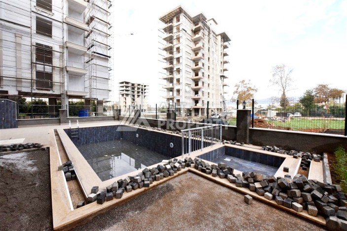 Квартира 1+1 в Махмутларе в новой резиденции, 50 м² - Ракурс 15