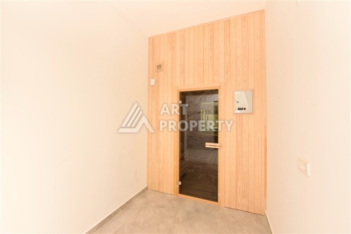Квартира 1+1 в Махмутларе в новой резиденции, 50 м² - Ракурс 17