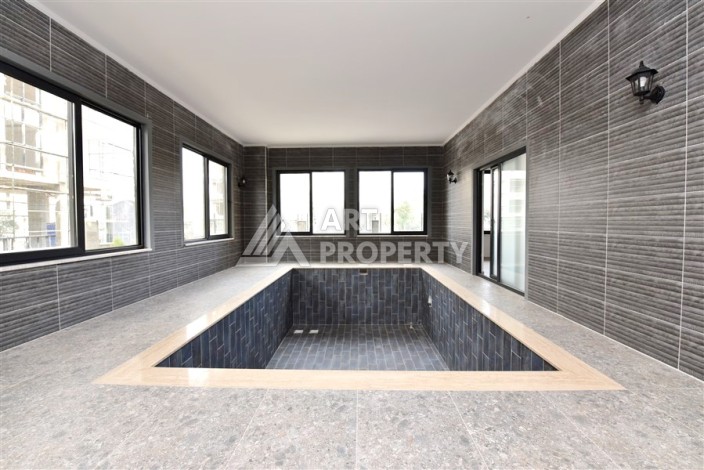 Квартира 1+1 в Махмутларе в новой резиденции, 50 м² - Ракурс 20