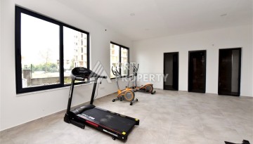 Квартира 1+1 в Махмутларе в новой резиденции, 50 м² - Ракурс 23