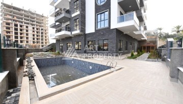 Квартира 1+1 в Махмутларе в новой резиденции, 50 м² - Ракурс 24